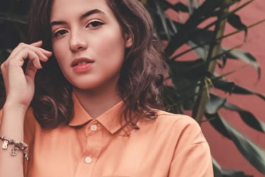 Lady in a peach shirt